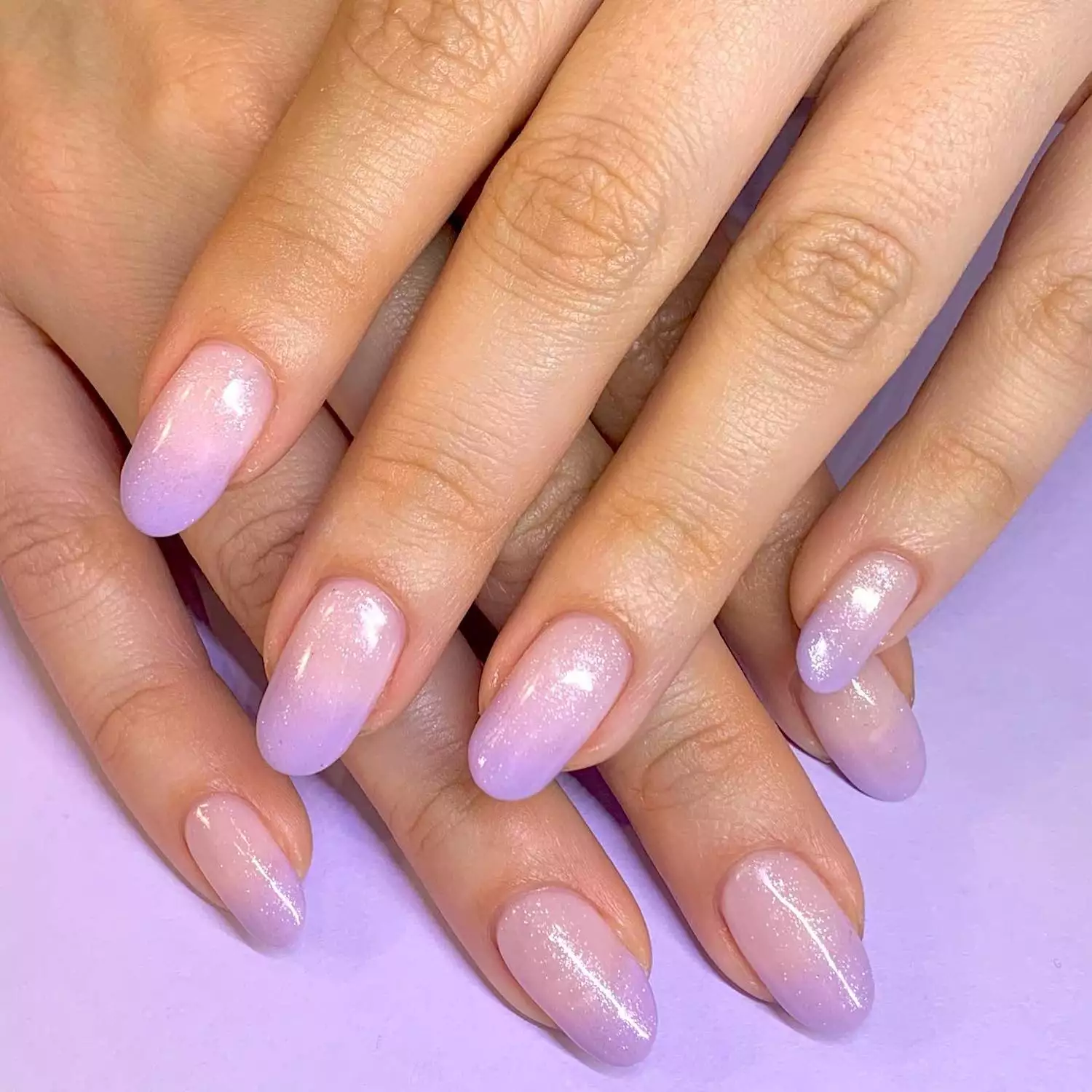 Lavender to baby pink shimmer gradient manicure