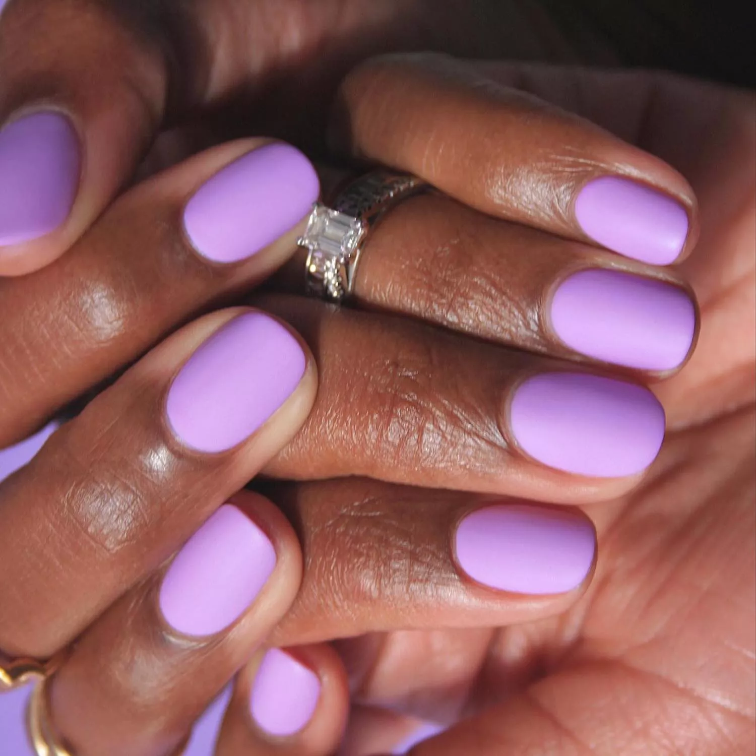 Manicure with allover bright lavender polish
