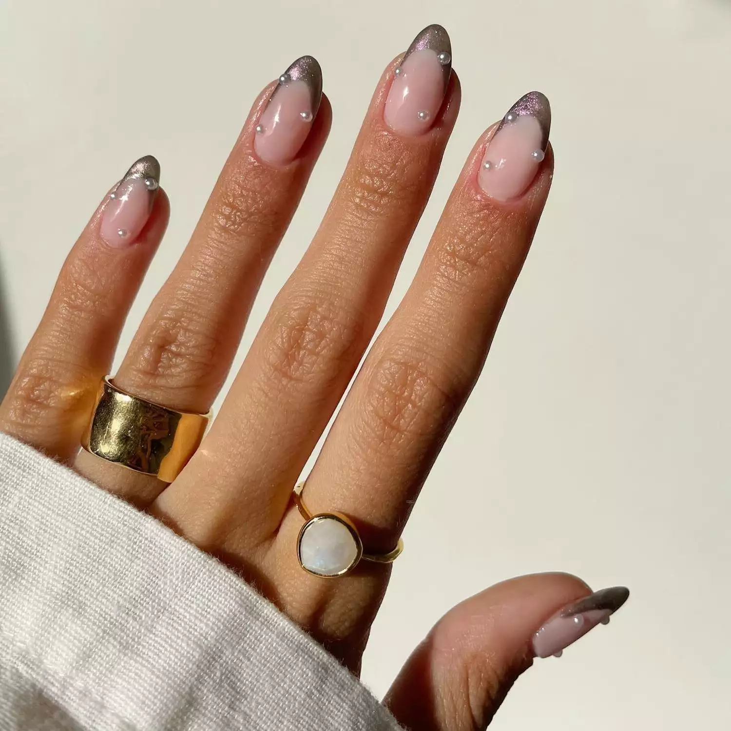 Chrome French manicure with pearl accents