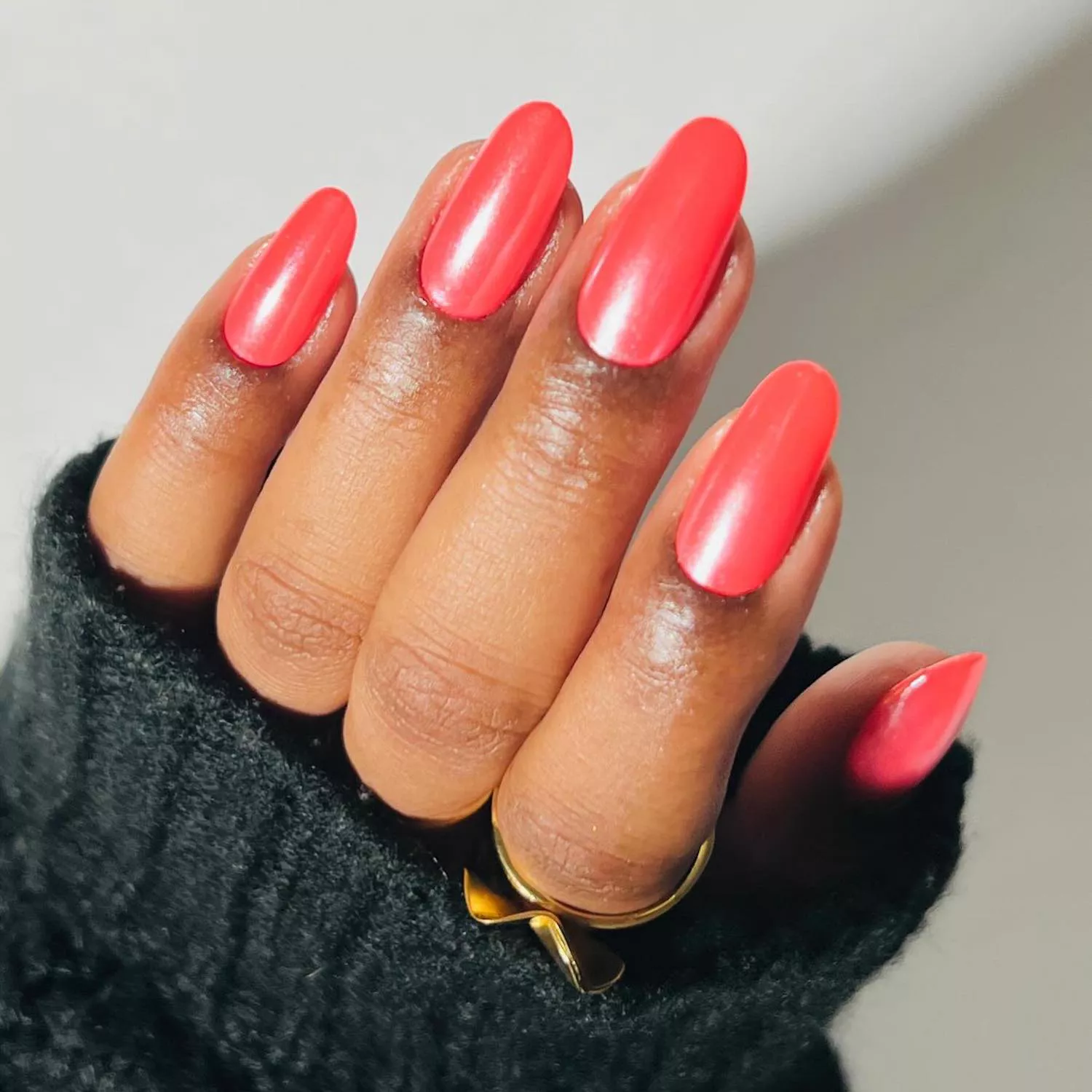 Coral manicure with chrome finish