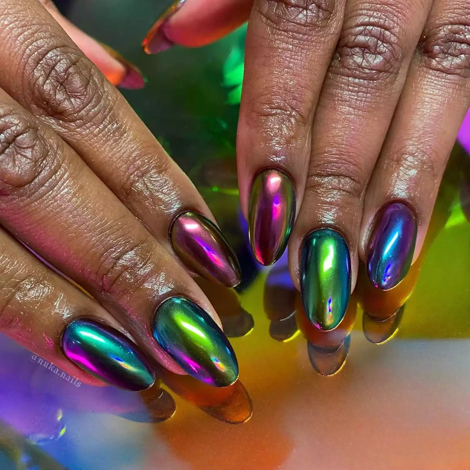 Iridescent rainbow chrome manicure