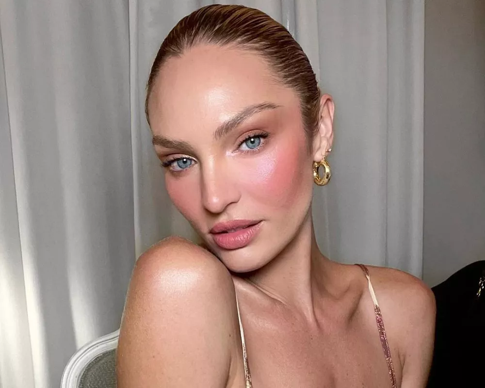 Model Candice Swanepoel fitting the "clean girl" aesthetic