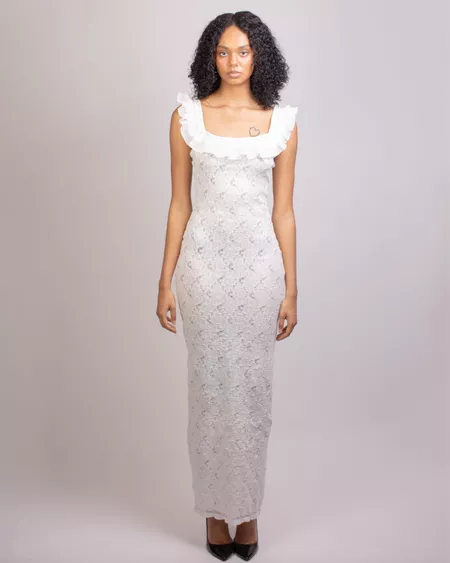 Model wearing lace Tia Adeola dress